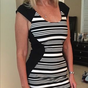 Dress-never worn, tags still on above knee length